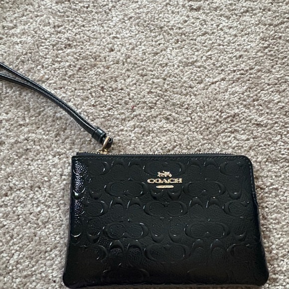 Coach Handbags - COACH Black Embossed Wristlet